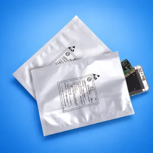 Two silver barrier bags with printed handling instructions